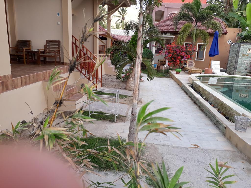 Kuta Bay Homestay Extérieur photo